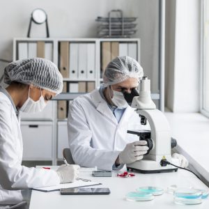 medium-shot-scientists-laboratory